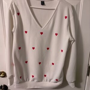 White Sweatshirt with Red Heart Accents